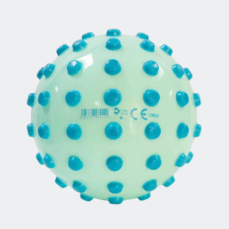 Green small learning to swim ball with dots